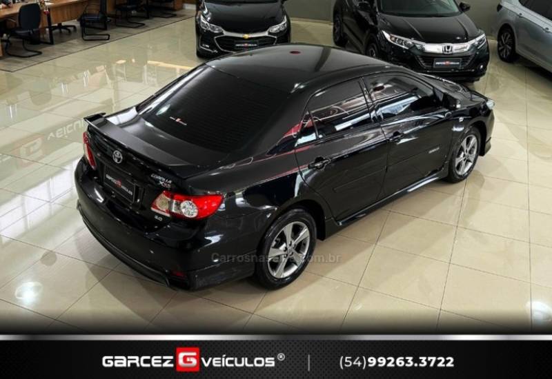 TOYOTA - COROLLA - 2013/2014 - Preta - R$ 75.900,00